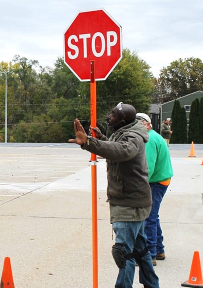 Man holding Stop Sign