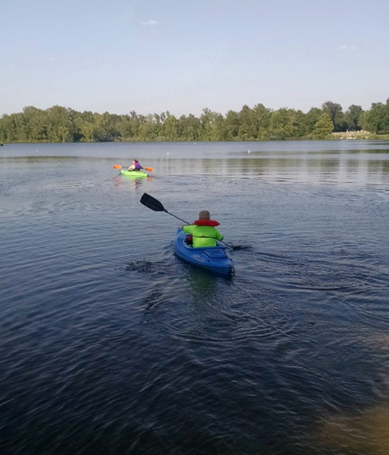 Two people kayaking on the lake at Arrowhead Lake Campground