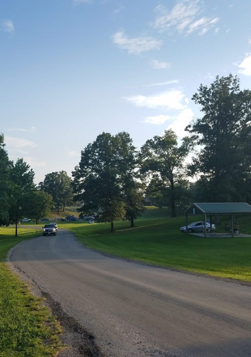 campground road with cars on road