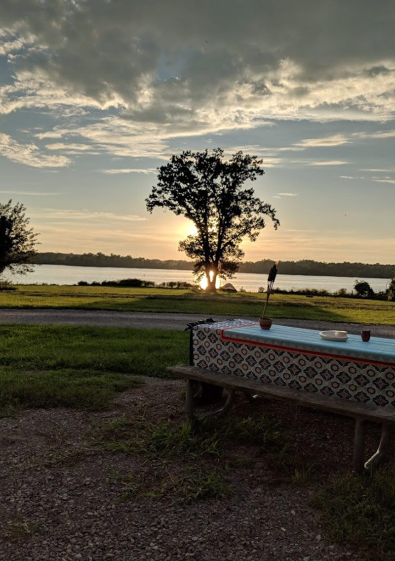 Picnic table on campground at sunset overlooking Crab Orchard Lake