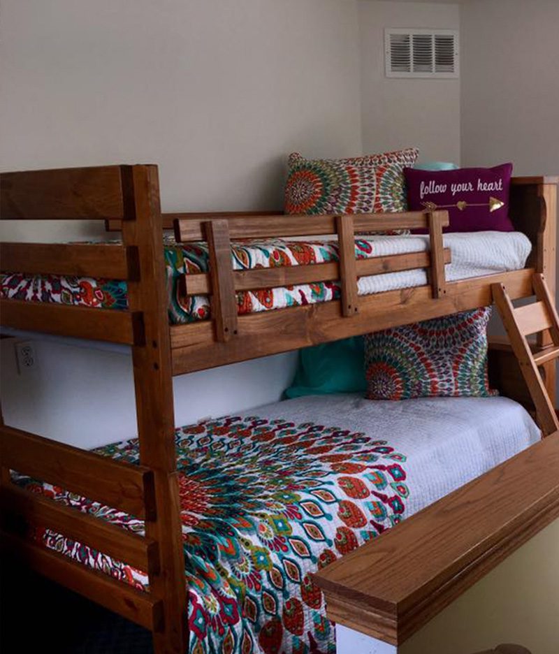 bunk beds with mandela patterned blankets