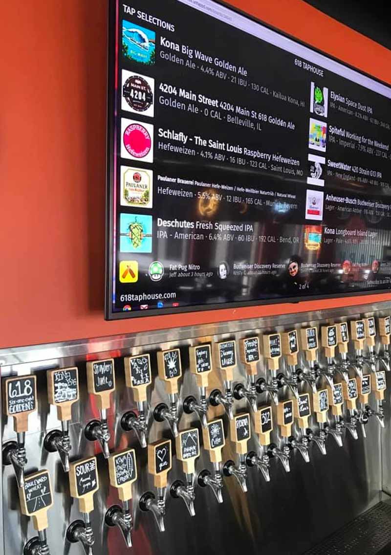 draft list on tv with taps below